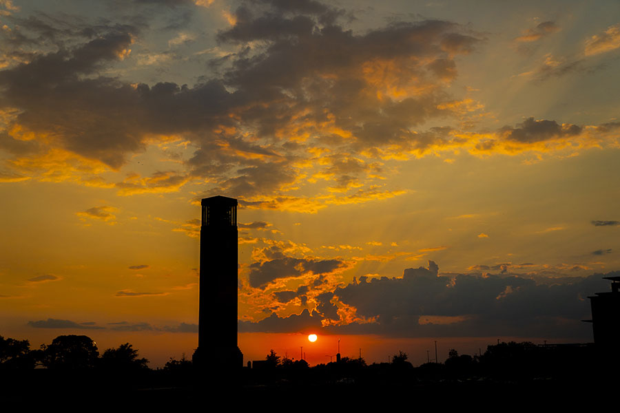 Albritton Tower silhouetted in the sunset.